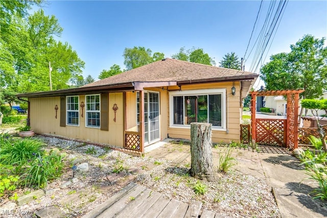 4944 Coleman Dr, Akron, OH 44319 - view of front of home featuring a pergola and a shingled roof