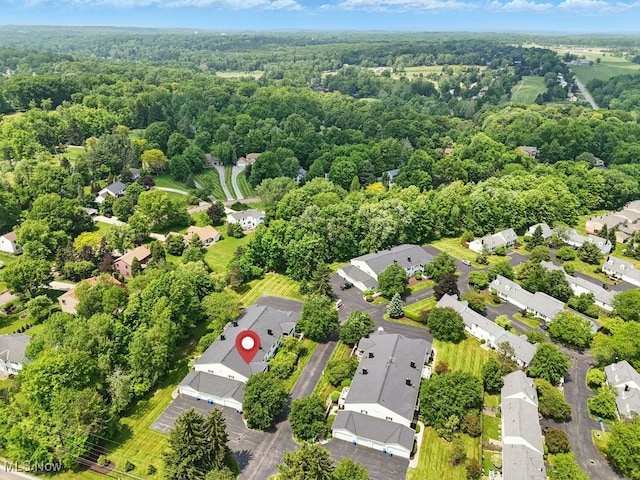 17682 Eastbrook Trl, Chagrin Falls, OH 44023 - aerial perspective of suburban area featuring a heavily wooded area