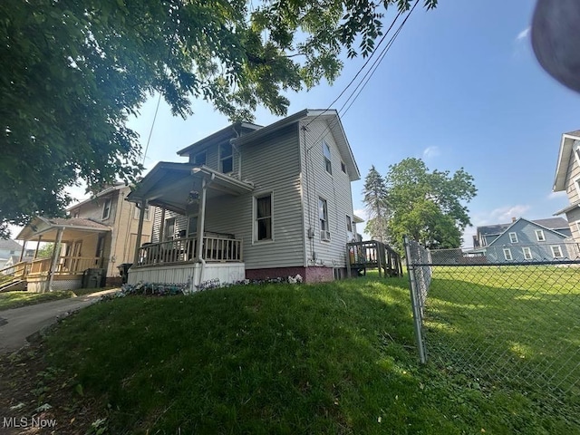 2411 Strasser Pl SW, Canton, OH 44710 - view of property exterior featuring a porch