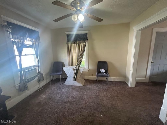 2411 Strasser Pl SW, Canton, OH 44710 - living area featuring carpet, plenty of natural light, a ceiling fan, and cooling unit