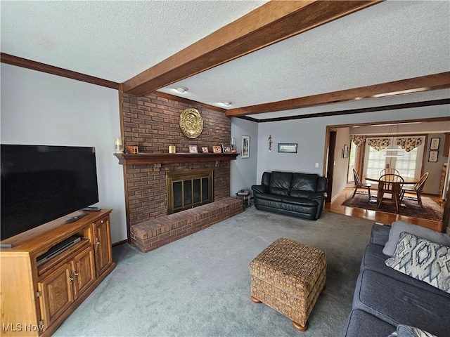6671 Queens Way N, Royalton, OH 44133 - living room with beamed ceiling, a textured ceiling, carpet flooring, and a brick fireplace