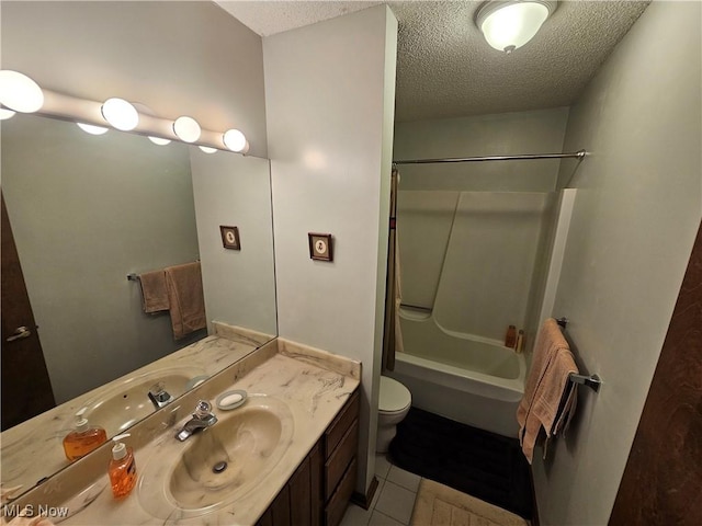 6671 Queens Way N, Royalton, OH 44133 - full bath featuring toilet, a textured ceiling, vanity, shower / bath combo with shower curtain, and tile patterned flooring