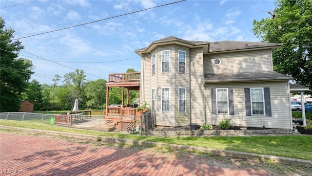21 E Maple Ave, New Concord, OH 43762 - view of property exterior featuring a wooden deck