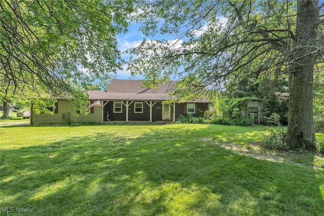 9708 Harrison Rd, Wakeman, OH 44889 - view of front facade featuring a front yard and a porch
