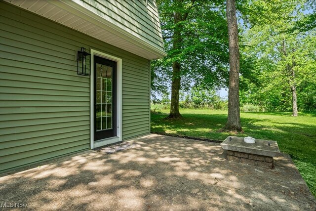 6730 Stone Rd, Medina, OH 44256 - wooden terrace with a patio and a yard