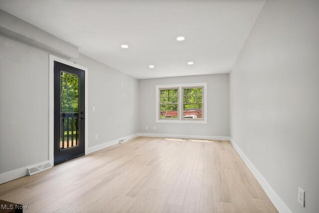 6730 Stone Rd, Medina, OH 44256 - empty room featuring plenty of natural light, light wood-type flooring, recessed lighting, and baseboards