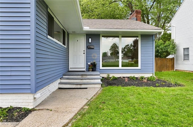 5679 Wilson Mills Rd, Highland Heights, OH 44143 - entrance to property with a chimney and roof with shingles