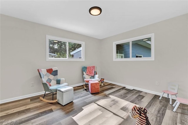 5679 Wilson Mills Rd, Highland Heights, OH 44143 - sitting room featuring wood finished floors and baseboards