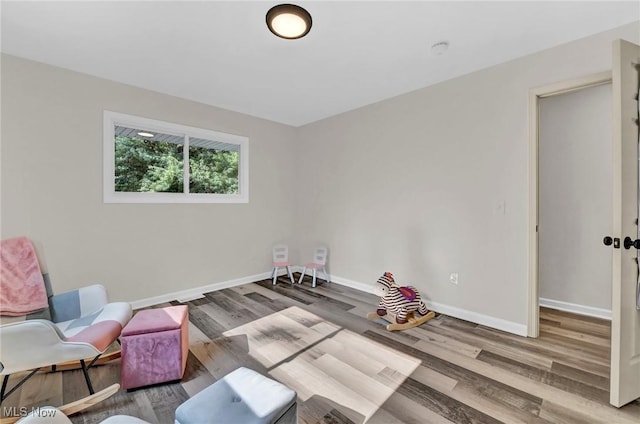 5679 Wilson Mills Rd, Highland Heights, OH 44143 - living area with wood finished floors and baseboards