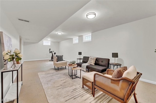 5679 Wilson Mills Rd, Highland Heights, OH 44143 - living room featuring baseboards, plenty of natural light, and finished concrete flooring