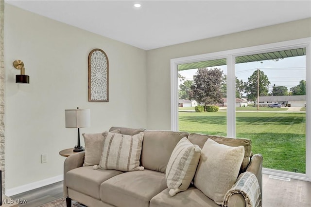 5679 Wilson Mills Rd, Highland Heights, OH 44143 - living room with wood finished floors, baseboards, and recessed lighting
