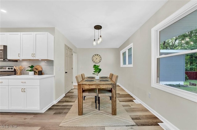 5679 Wilson Mills Rd, Highland Heights, OH 44143 - dining room featuring light wood-type flooring, baseboards, and recessed lighting