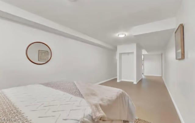 5679 Wilson Mills Rd, Highland Heights, OH 44143 - bedroom featuring baseboards