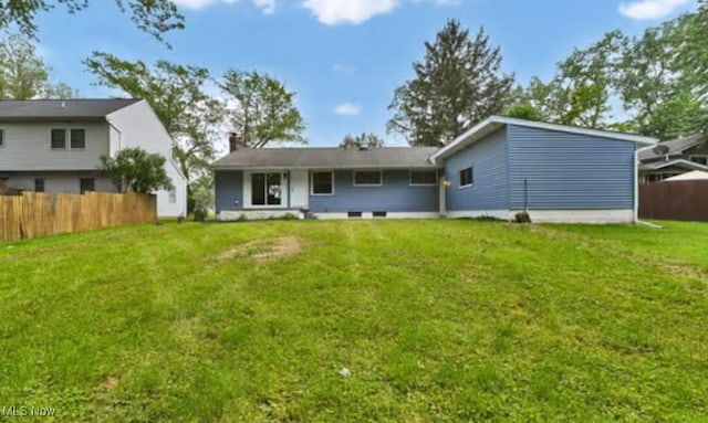 5679 Wilson Mills Rd, Highland Heights, OH 44143 - back of house with a chimney