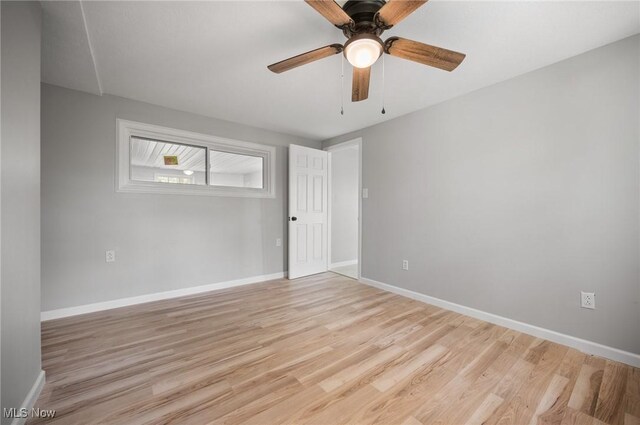 403 Palomino Ct, Lagrange, OH 44050 - unfurnished room with light wood-style floors and baseboards