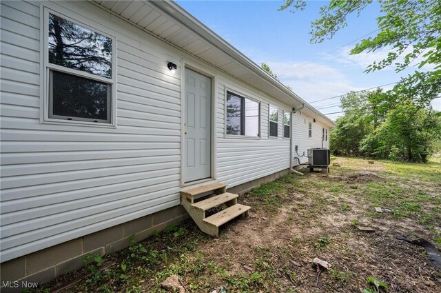 403 Palomino Ct, Lagrange, OH 44050 - view of home's exterior featuring entry steps and cooling unit