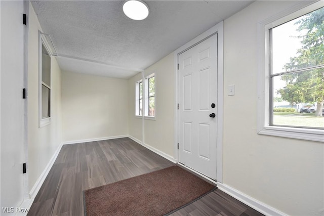 20969 Stanford, Fairview Park, OH 44126 - entryway with wood finished floors, baseboards, and a textured ceiling