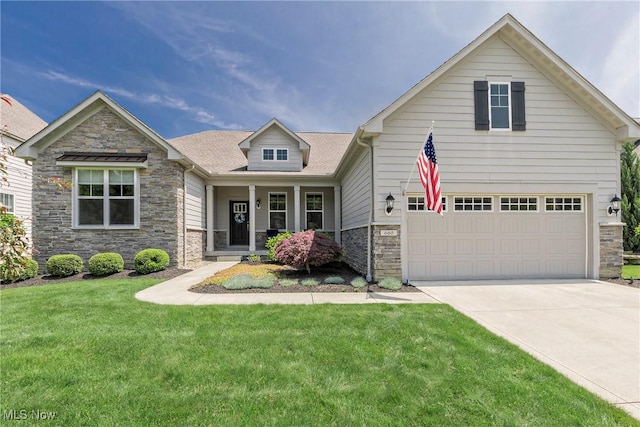 660 Shinnecock Ln, Aurora, OH 44202 - craftsman house with stone siding, driveway, and a front lawn
