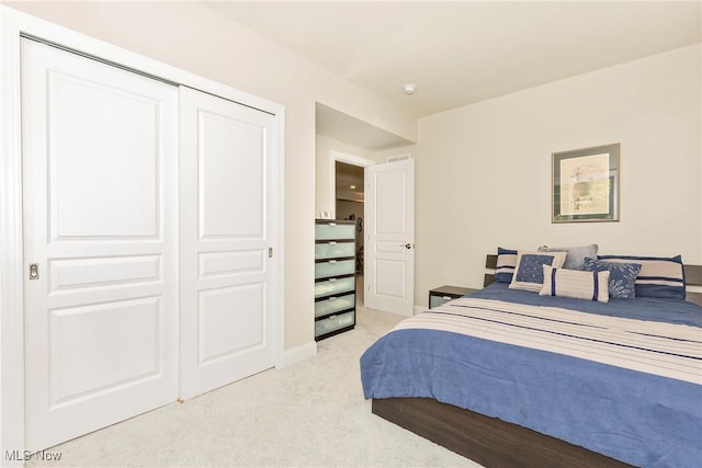 660 Shinnecock Ln, Aurora, OH 44202 - bedroom with light carpet and a closet