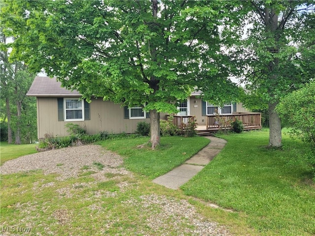 5115 Sangria Dr, West Salem, OH 44287 - view of property hidden behind natural elements with a wooden deck and a front lawn
