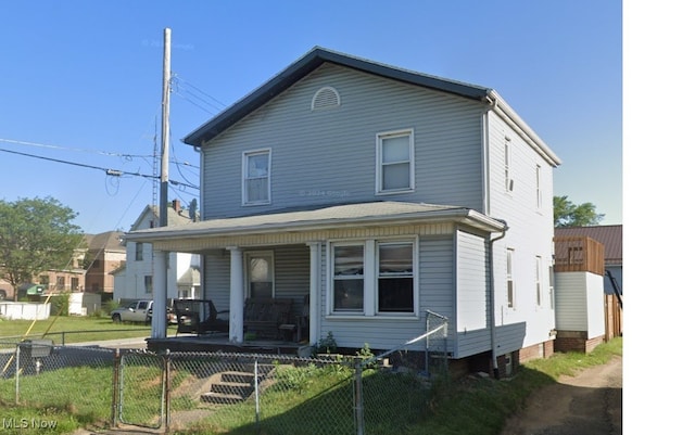 2511 4th St NW, Canton, OH 44708 - view of front of property with a porch, a fenced front yard, and a gate