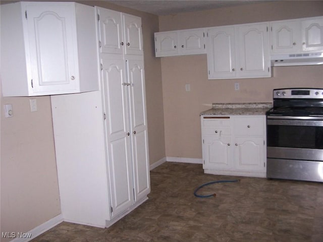 1475 Laurel Dr, West Salem, OH 44287 - kitchen with stainless steel electric range oven, under cabinet range hood, white cabinetry, and dark flooring