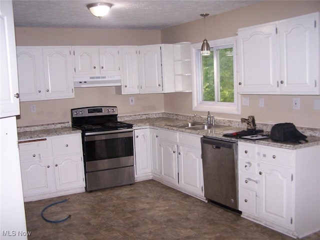 1475 Laurel Dr, West Salem, OH 44287 - kitchen with stainless steel appliances, under cabinet range hood, a sink, white cabinetry, and a textured ceiling