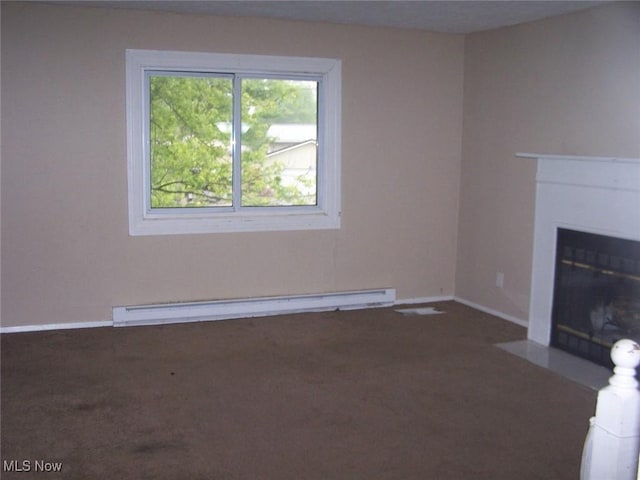 1475 Laurel Dr, West Salem, OH 44287 - unfurnished living room with baseboard heating, a fireplace with flush hearth, carpet, and baseboards
