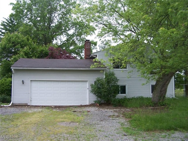 1475 Laurel Dr, West Salem, OH 44287 - view of side of property with a chimney