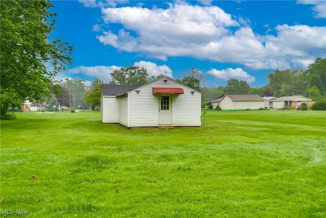 3985 Etter Rd, Mogadore, OH 44260 - view of grassy yard with an outbuilding