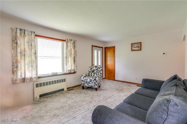 3985 Etter Rd, Mogadore, OH 44260 - carpeted living area with radiator heating unit and baseboards