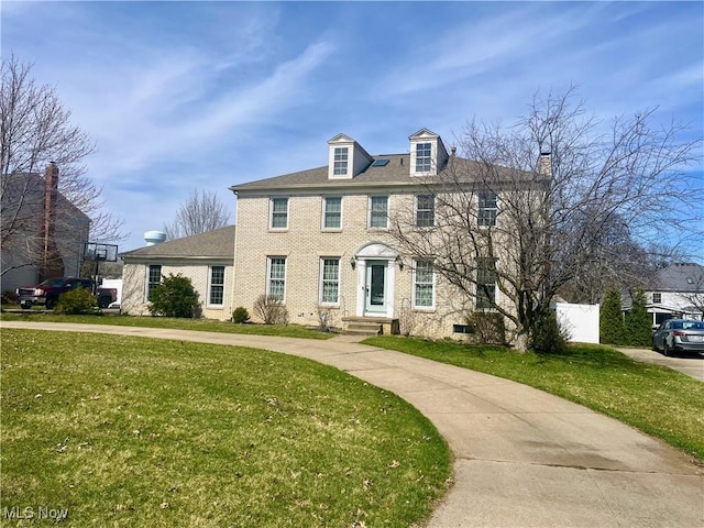 1023 55th St NE, Canton, OH 44721 - view of front of property featuring brick siding and a chimney