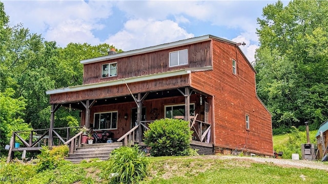 498 County Road 28, Steubenville, OH 43952 - rustic home featuring a porch