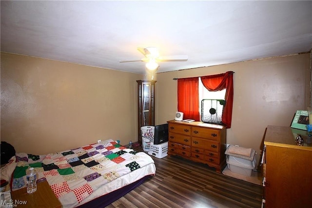 498 County Road 28, Steubenville, OH 43952 - bedroom with dark wood-type flooring and a ceiling fan