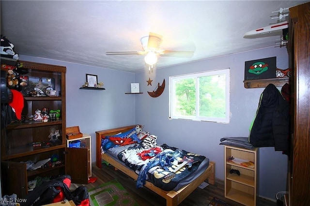 498 County Road 28, Steubenville, OH 43952 - bedroom with wood finished floors and ceiling fan