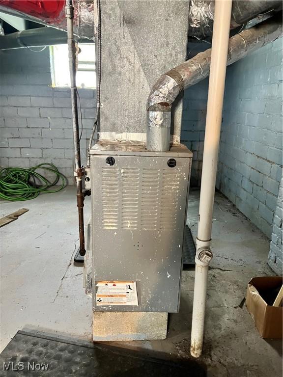 3524 E 139th St, Cleveland, OH 44120 - utility room featuring heating unit