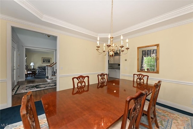 304 Fox Way, Chagrin Falls, OH 44022 - dining space featuring crown molding, wood finished floors, and a chandelier