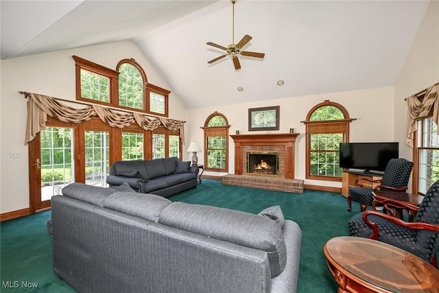 304 Fox Way, Chagrin Falls, OH 44022 - living room with carpet flooring, high vaulted ceiling, ceiling fan, a fireplace, and healthy amount of natural light