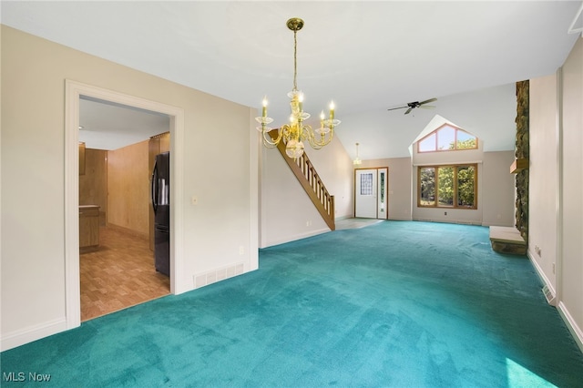1908 Players Cir, Uniontown, OH 44685 - unfurnished living room with carpet flooring, stairway, ceiling fan, a chandelier, and baseboards