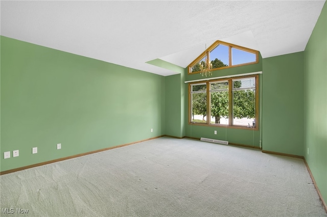 1908 Players Cir, Uniontown, OH 44685 - spare room featuring baseboards, carpet floors, and lofted ceiling