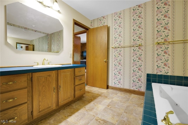 1908 Players Cir, Uniontown, OH 44685 - full bath featuring vanity and a jetted tub