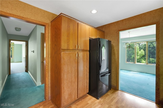 1908 Players Cir, Uniontown, OH 44685 - kitchen with freestanding refrigerator, light wood-style floors, light carpet, baseboards, and recessed lighting