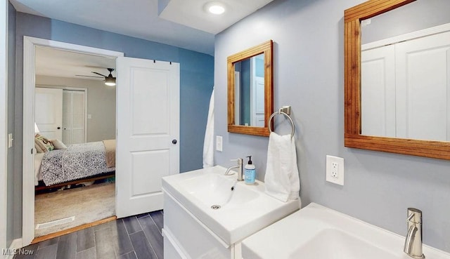 932 Bell Rd, Chagrin Falls, OH 44022 - bathroom featuring wood finished floors, ceiling fan, vanity, and recessed lighting
