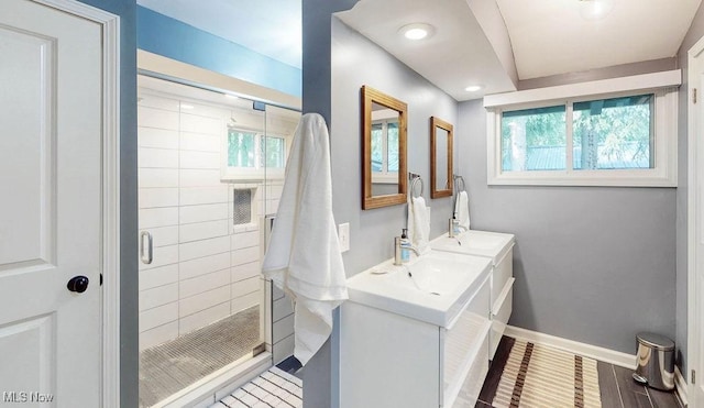 932 Bell Rd, Chagrin Falls, OH 44022 - full bathroom with healthy amount of natural light, a stall shower, vanity, baseboards, and recessed lighting
