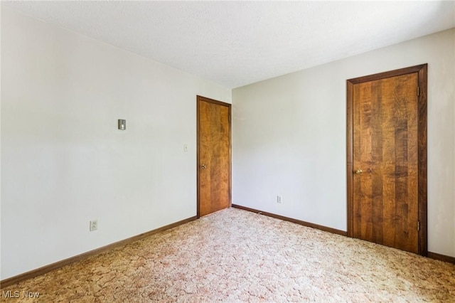 43628 Crestview Rd, Columbiana, OH 44408 - carpeted spare room featuring baseboards