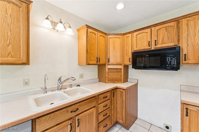 43628 Crestview Rd, Columbiana, OH 44408 - kitchen featuring black microwave, a sink, light countertops, light tile patterned floors, and recessed lighting