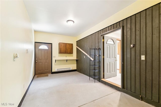 43628 Crestview Rd, Columbiana, OH 44408 - entrance foyer with a baseboard heating unit, baseboards, and concrete flooring