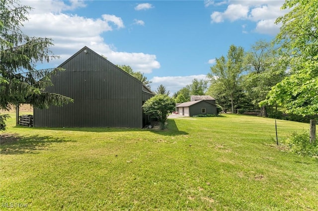43628 Crestview Rd, Columbiana, OH 44408 - view of green lawn featuring an outdoor structure and a pole building