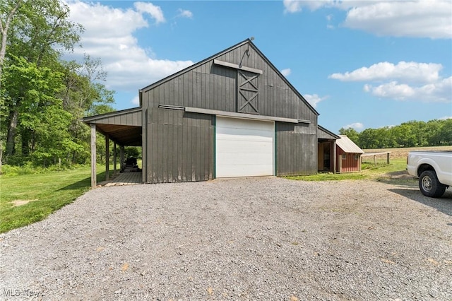 43628 Crestview Rd, Columbiana, OH 44408 - garage with gravel driveway and a detached garage