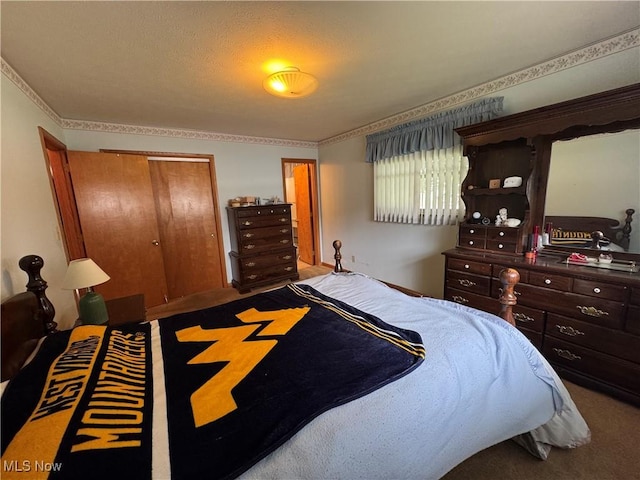 9 James Ct, Parkersburg, WV 26105 - carpeted bedroom featuring a closet and crown molding